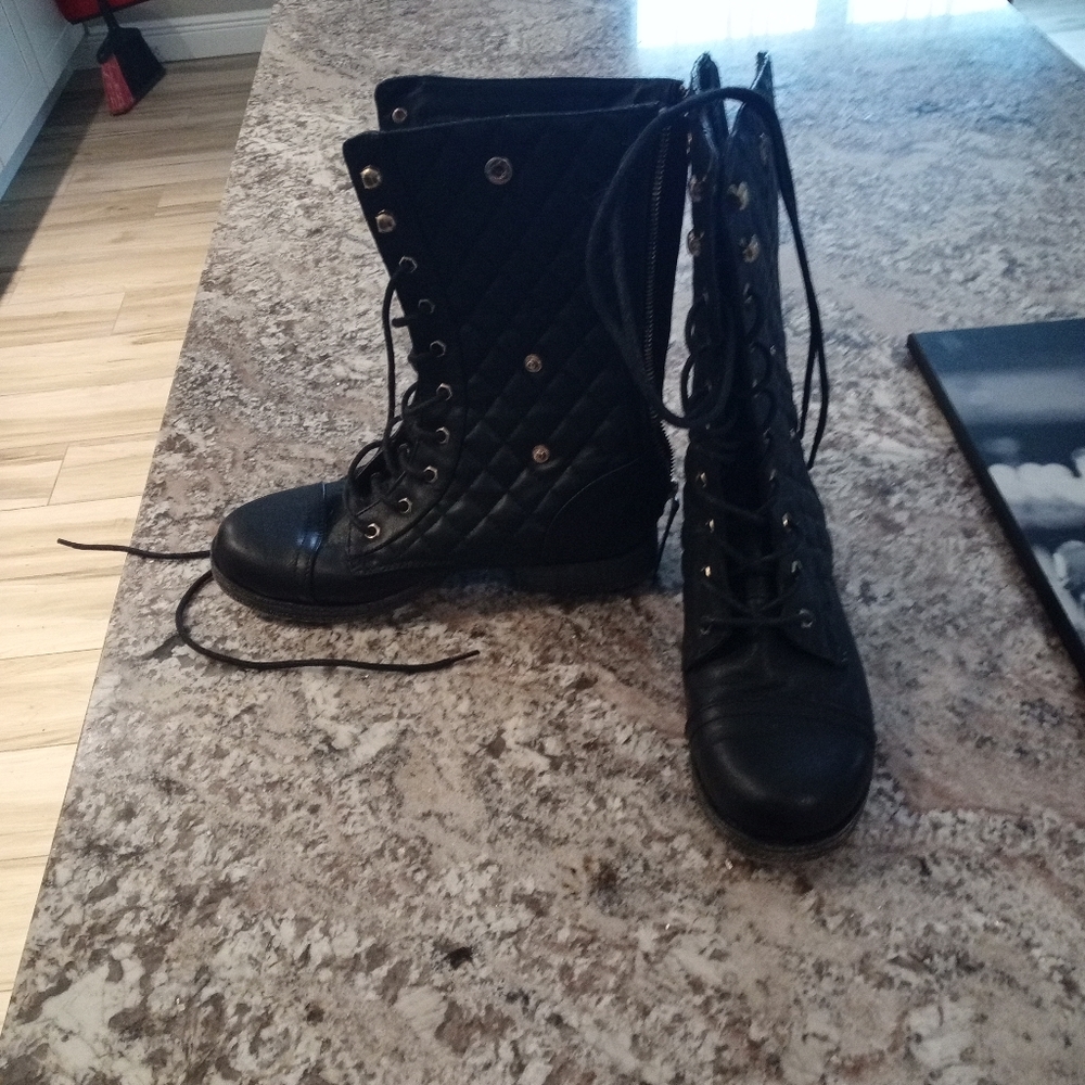 Lace up or zip up boots that fold